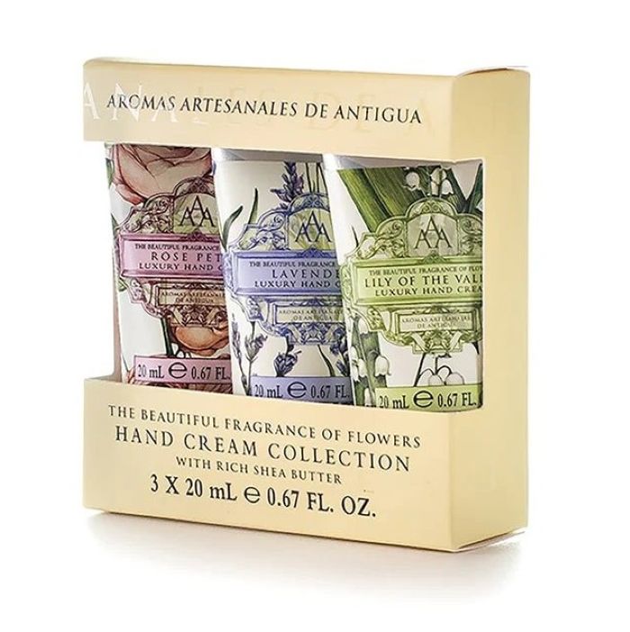 Aromas Artesanales de Antigua Mini Hand Cream Gift Set featuring three travel-size tubes in a gift box: Rose Petal, Lavender, and Lily of the Valley scents—luxurious, vegan-friendly skincare inspired by the tropical beauty of Antigua, perfect for gifting or on-the-go hydration