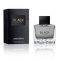Banderas Seduction perfume in a sleek black glass bottle with a matching black cap, displayed alongside its black textured packaging box with silver writing on a clean white background.