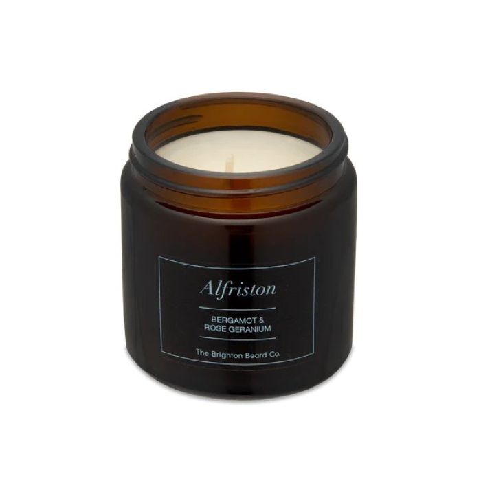 Brighton Beard Brown Candle in glass container against a white background     