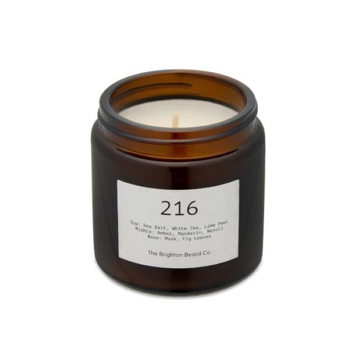Brighton Beard Co. 216 Candle in a minimalist glass jar with clean label design and bold typography, displayed closed against a white background