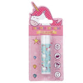 Enchanted Rainbows Lipbalm in stick container with blue background and unicorns and rainbows on the foreground. Packaged in pink packaging with unicorn motif