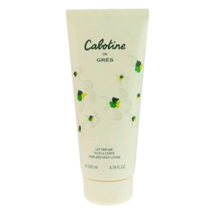 Grès Cabotine body lotion in a soft, floral-themed tube with light green accents and colorful flower illustrations—hydrating body care product that complements the fresh, feminine Cabotine fragrance collection