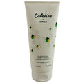 Grès Cabotine shower gel in a sleek, floral-themed tube featuring soft green accents and vibrant flower prints—luxurious bath product offering a fresh, feminine scent to complement the iconic Cabotine fragrance line.