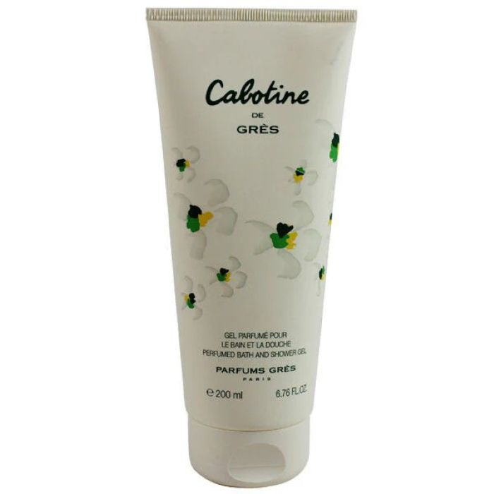 Grès Cabotine shower gel in a sleek, floral-themed tube featuring soft green accents and vibrant flower prints—luxurious bath product offering a fresh, feminine scent to complement the iconic Cabotine fragrance line.