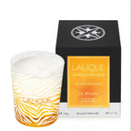 Lalique candle with zebra pattern and packaging on a white background