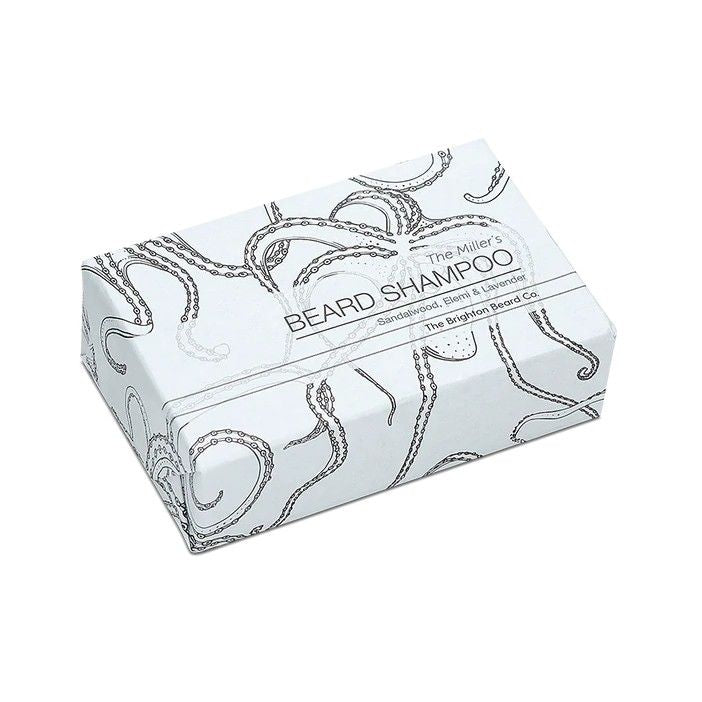 Brighton Beard Shampoo Bar shown in a compact square shape with bold, vintage-style nautical branding on white kraft paper packaging—artisan grooming product for beards displayed against a clean, minimal background.