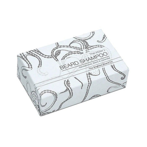 Brighton Beard Shampoo Bar shown in a compact square shape with bold, vintage-style nautical branding on white kraft paper packaging—artisan grooming product for beards displayed against a clean, minimal background.