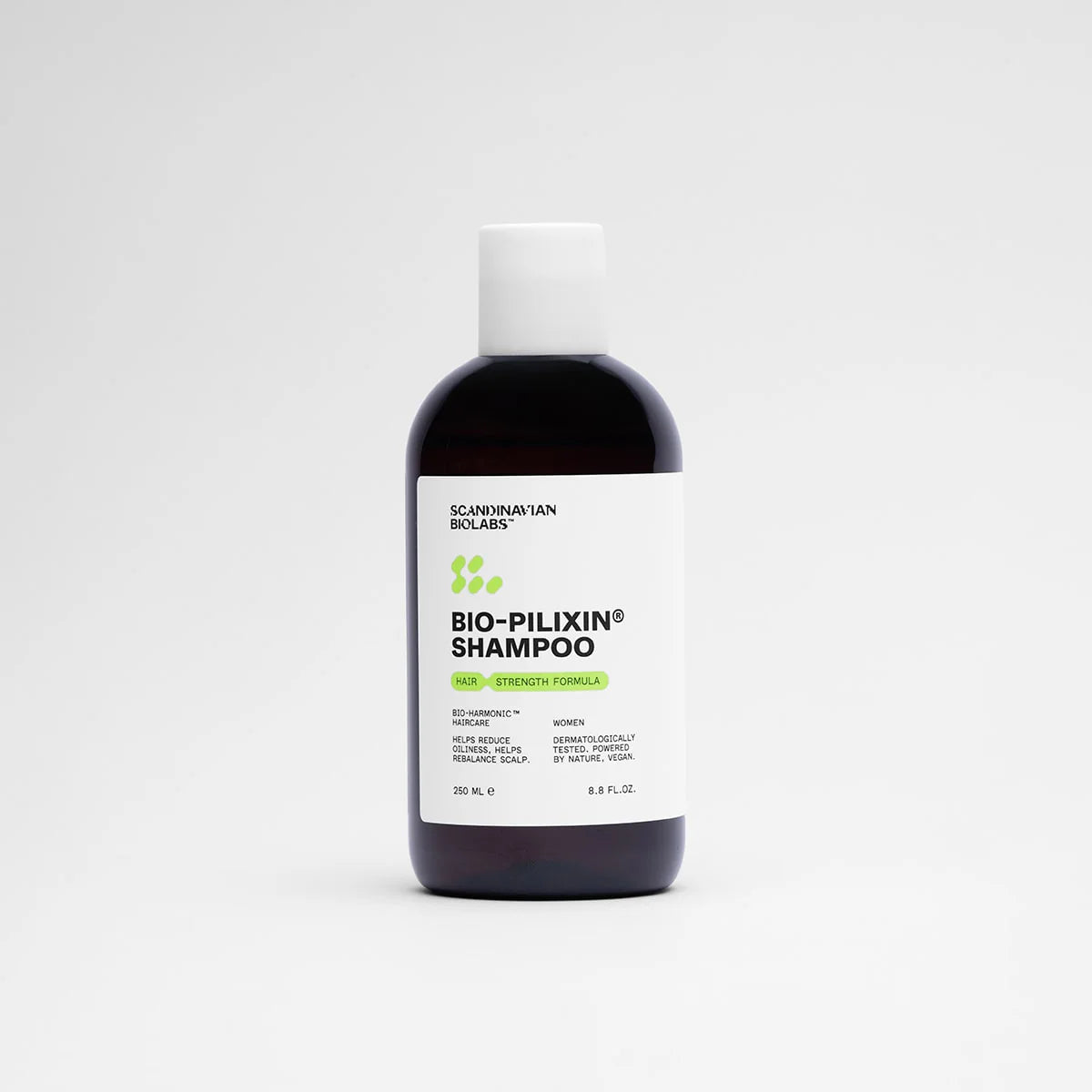 Bottle of Bio-Pilixin Shampoo on a white background