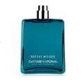 Blue Secret Woods by CoSTUME NATIONAL bottle. Blue perfume bottle against white background