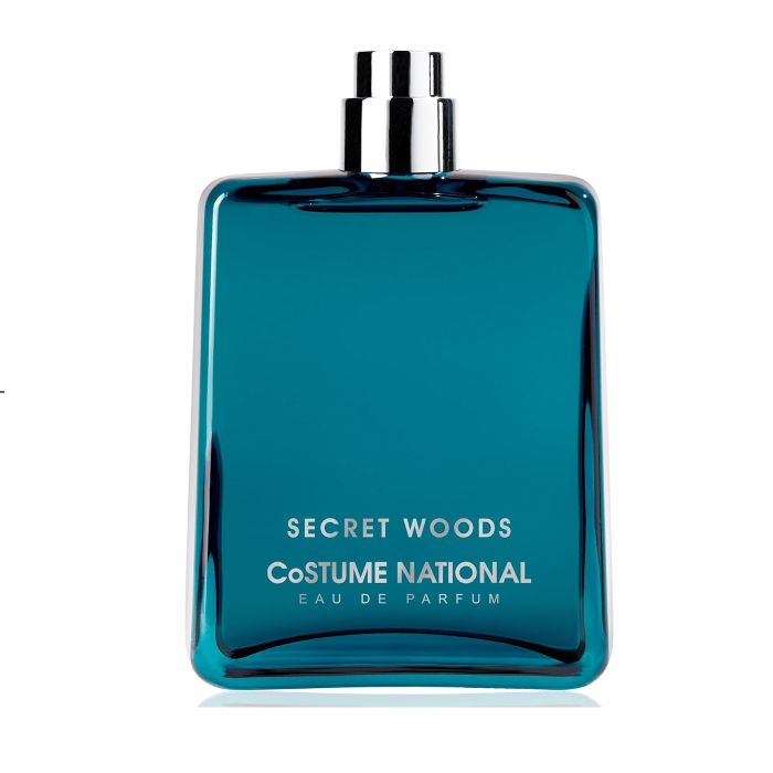 Blue Secret Woods by CoSTUME NATIONAL bottle. Blue perfume bottle against white background