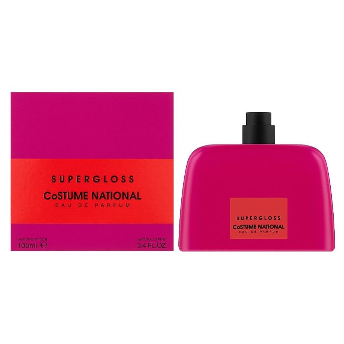 Pink Supergloss 100ml fragrance bottle in bright pink next to pink outer packaging with a red stip. 